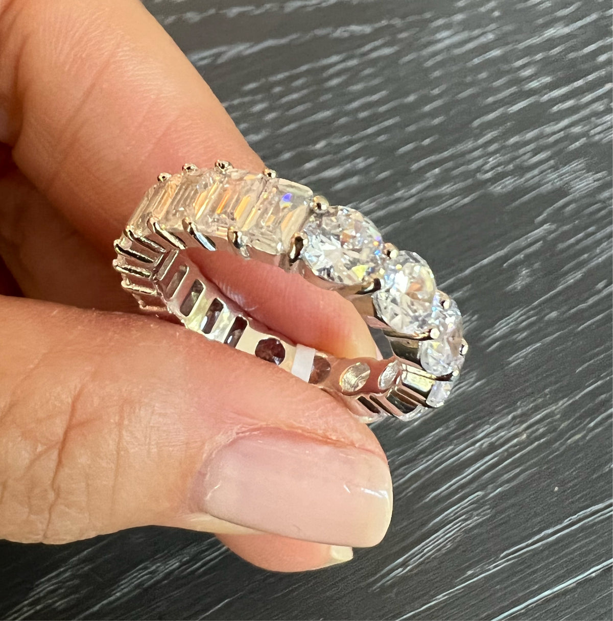 Two Sided Round & Emerald Eternity Band